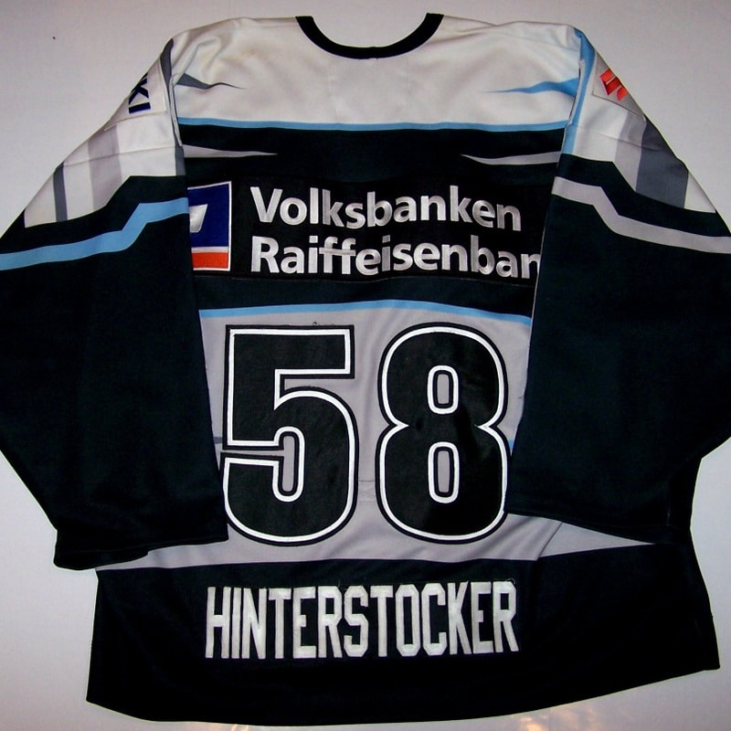 This jersey was game worn during the Hamburg Freezers preseason and season by Benjamin Hinterstocker