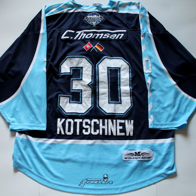 Game Worn hockey jersey of Hamburg Freezers goalie Dimitrij Kotschnew back