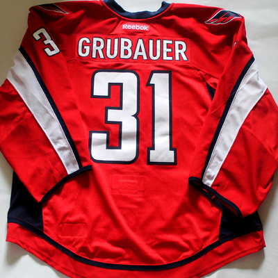 Game Worn hockey jersey of Washington Capitals goalie Philipp Grubauer - Back