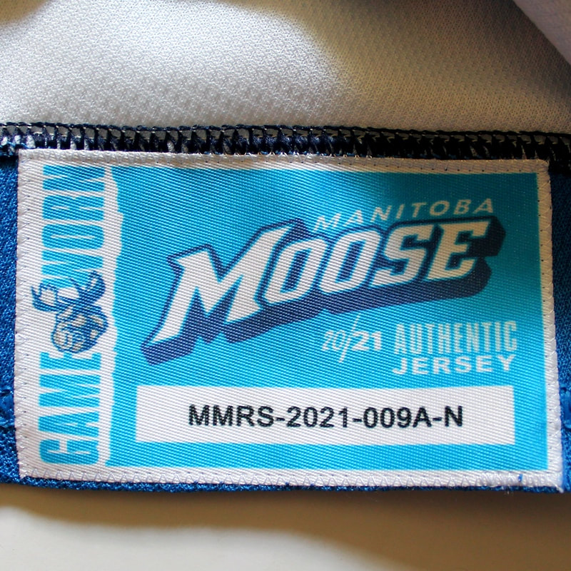 Game Worn Manitoba Moose Trikot von Leon Gawanke - Setstamp Detail