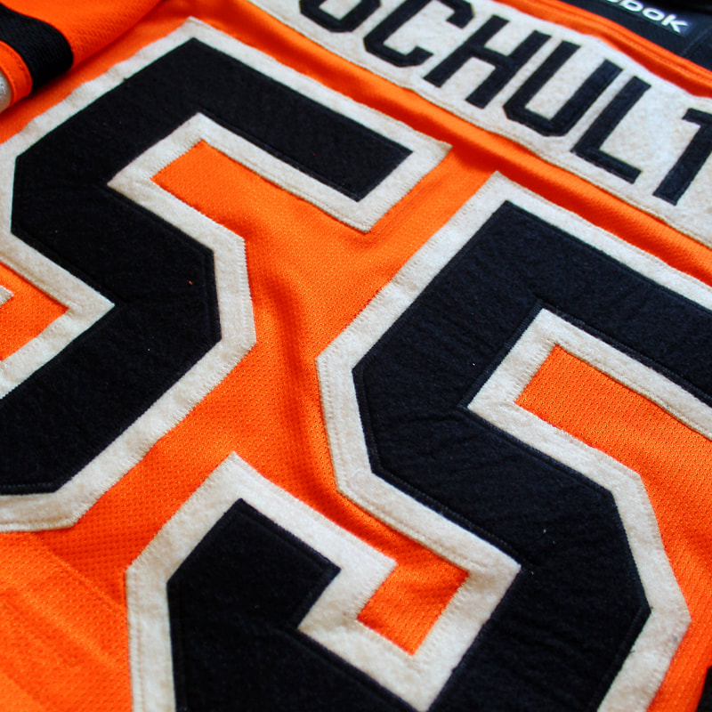 Closeup on name and number of the Nick Schultz Philadelphia Flyers game worn jersey